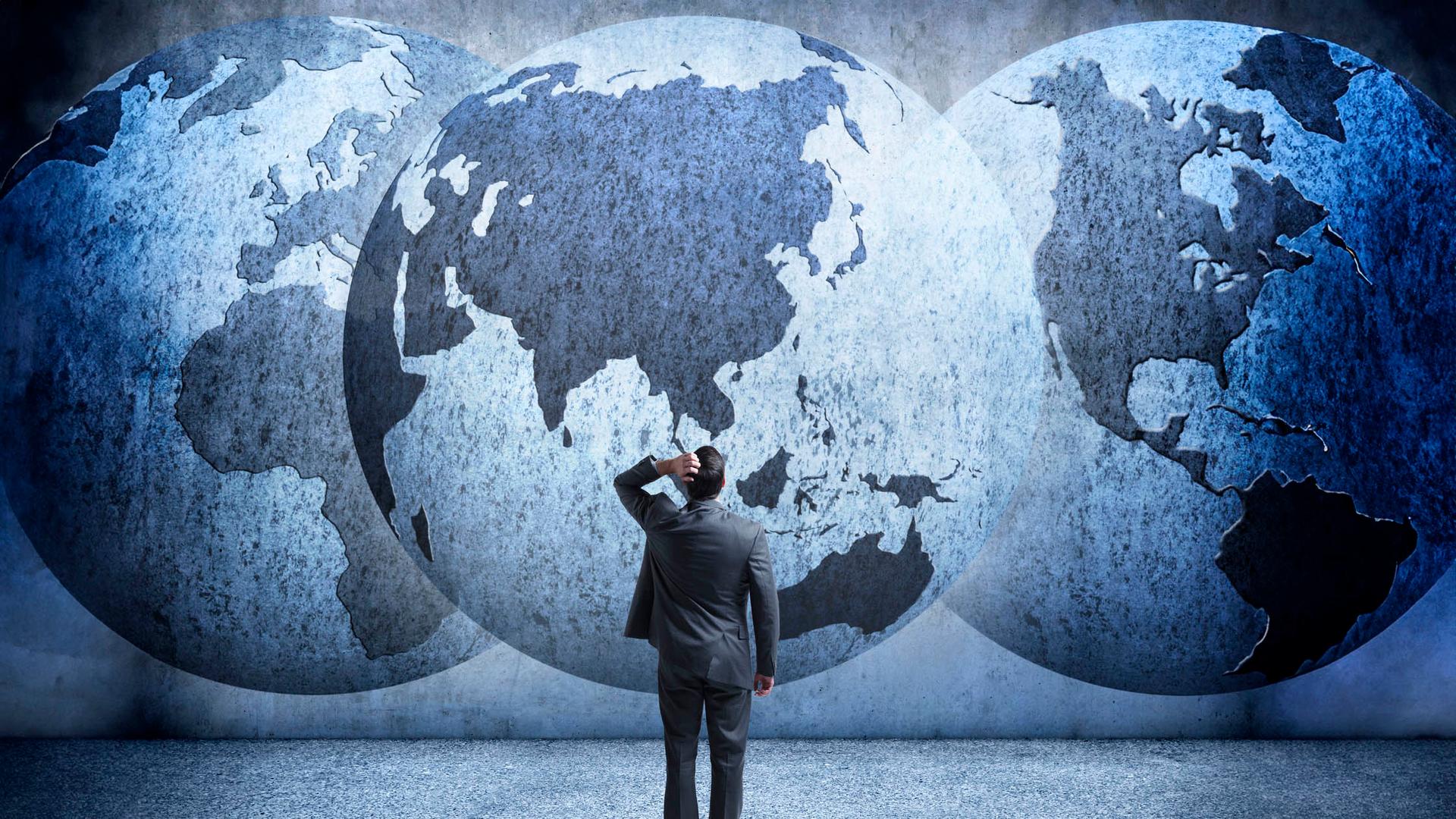 businessman-earth-confused.jpg
